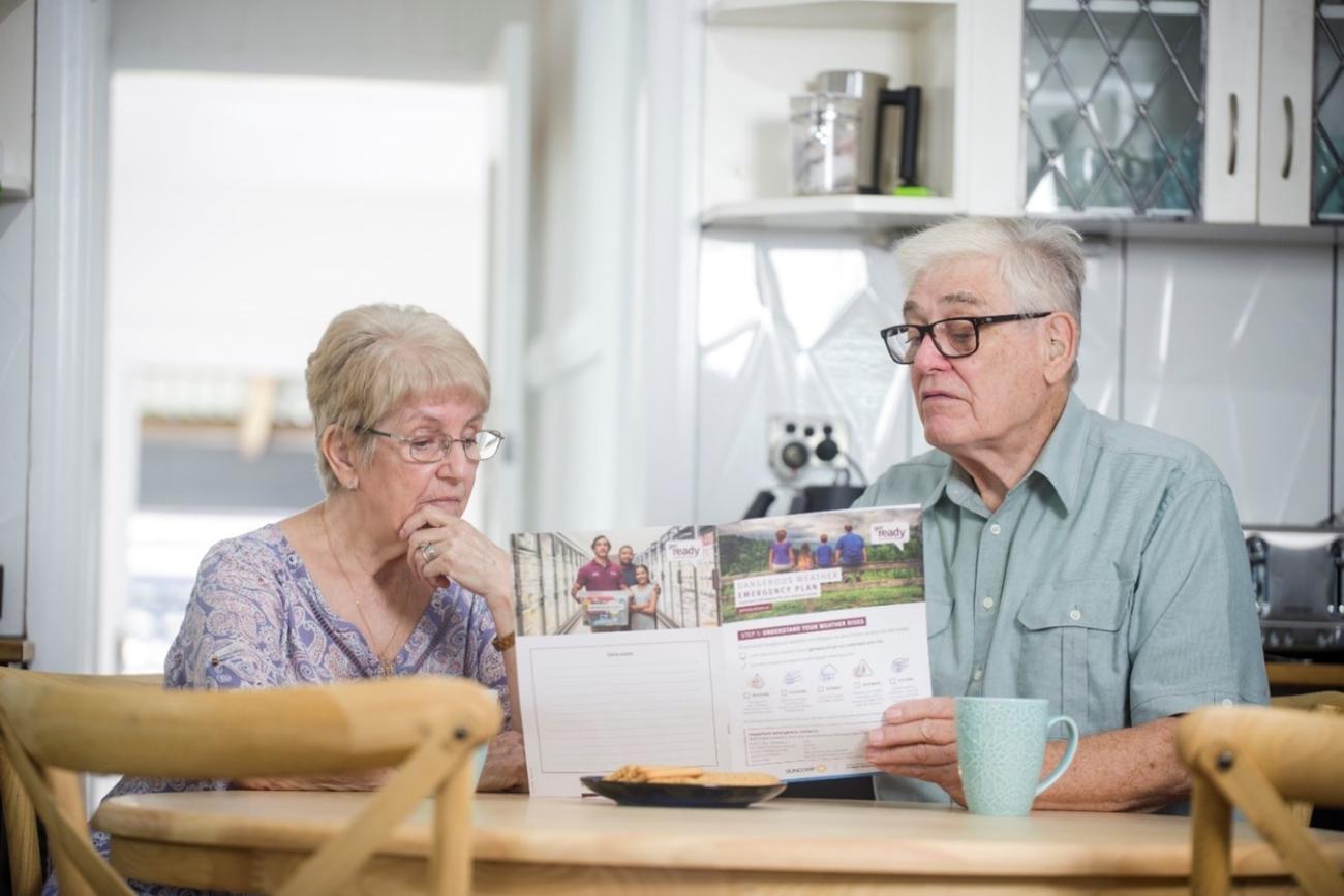 Couple creating a get ready queensland household plan